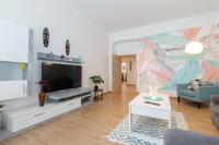 TV a/nebo společenská místnost v ubytování Stay Inn Apartments Naplavka