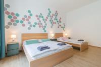 Postel nebo postele na pokoji v ubytování Stay Inn Apartments Naplavka