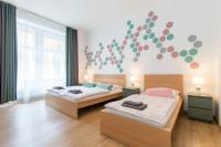 Postel nebo postele na pokoji v ubytování Stay Inn Apartments Naplavka