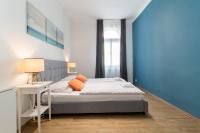 Postel nebo postele na pokoji v ubytování Stay Inn Apartments Naplavka