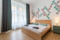 Postel nebo postele na pokoji v ubytování Stay Inn Apartments Naplavka