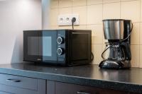 Kuchyň nebo kuchyňský kout v ubytování Stay Inn Apartments Naplavka