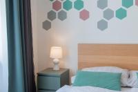 Postel nebo postele na pokoji v ubytování Stay Inn Apartments Naplavka