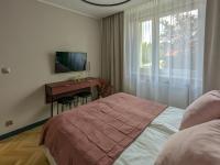 Posteľ alebo postele v izbe v ubytovaní Apartament nad morzem