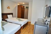 TV a/nebo společenská místnost v ubytování Miramar Evergreen Hotel