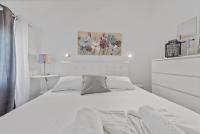 Łóżko lub łóżka w pokoju w obiekcie Apartments Petrina