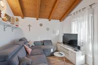 Telewizja i/lub zestaw kina domowego w obiekcie Apartments Petrina