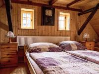 Postel nebo postele na pokoji v ubytování Holiday Home Jizerka by Interhome