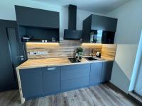 Kuchyň nebo kuchyňský kout v ubytování ApartmányVrbno Relax