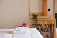 A bed or beds in a room at Santos Holidays