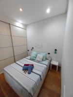 Postel nebo postele na pokoji v ubytování Pleno centro, Terraza, Principe, 5 min casco vello y estación AVE