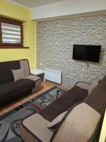Televízia a/alebo spoločenská miestnosť v ubytovaní APARTAMENT ELIZABETH