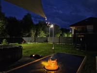 Ogród w obiekcie Apartament rodzinny Słoneczna Sosnówka
