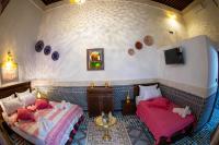 Riad Taj Fesにあるベッド