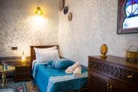 Riad Taj Fesにあるベッド