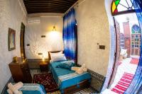 Riad Taj Fesにあるベッド