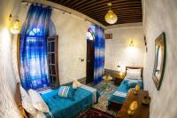 Riad Taj Fesにあるベッド