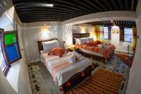 Riad Taj Fesにあるベッド