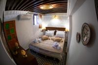 Riad Taj Fesにあるベッド