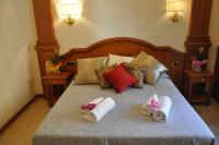 A bed or beds in a room at Rome Imperial Crown