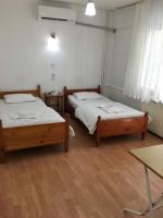 Postel nebo postele na pokoji v ubytování KOÇAN OTEL Hatice Karakoçan