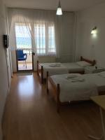 Postel nebo postele na pokoji v ubytování KOÇAN OTEL Hatice Karakoçan