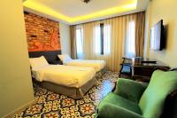 A bed or beds in a room at A Plus Residence