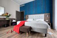 A bed or beds in a room at Hotel Concord
