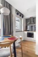 Kuchnia lub aneks kuchenny w obiekcie Unique Apartments - Angielska Grobla
