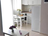Kuchyňa alebo kuchynka v ubytovaní Supreme City Heart Suites