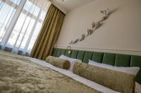 Postel nebo postele na pokoji v ubytování Hotel Zlatá Hvězda