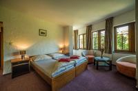 Postel nebo postele na pokoji v ubytování Hotel Pivovarská bašta