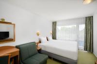 Posteľ alebo postele v izbe v ubytovaní Danubius Hotel Annabella