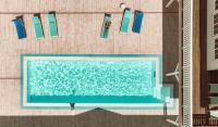 an overhead view of a swimming pool on a beach at Panorama Seeresort &amp; Spa in Warnitz