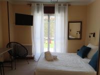 Postel nebo postele na pokoji v ubytování Hostal Pensión Mar de Plata
