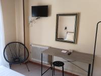 TV a/nebo společenská místnost v ubytování Hostal Pensión Mar de Plata