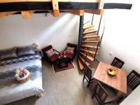 an overhead view of a room with a bed and a table at Rudnički proplanak in Rudnik Kačerski