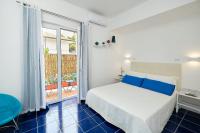 A bed or beds in a room at Villa Torù