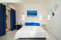 A bed or beds in a room at Villa Torù
