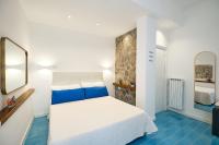 A bed or beds in a room at Villa Torù