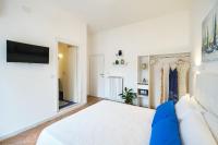 A bed or beds in a room at Villa Torù