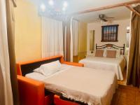 Posteľ alebo postele v izbe v ubytovaní Hotel Hospederia Zacatin