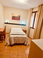 Posteľ alebo postele v izbe v ubytovaní Hotel Hospederia Zacatin