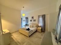 Postel nebo postele na pokoji v ubytování Thomas Apartments Katapola - Chora