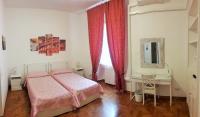 A bed or beds in a room at CiaoRoma!