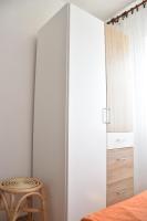 Posteľ alebo postele v izbe v ubytovaní Apartman Miki