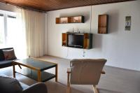 Televízia a/alebo spoločenská miestnosť v ubytovaní Apartman Miki