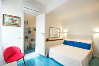A bed or beds in a room at Villa Torù
