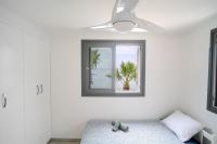 Postel nebo postele na pokoji v ubytování Meneou Blu Beach House*