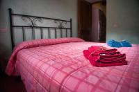A bed or beds in a room at Agriturismo Biagiotti